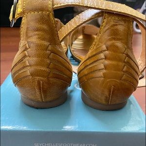 Mustard colored flats